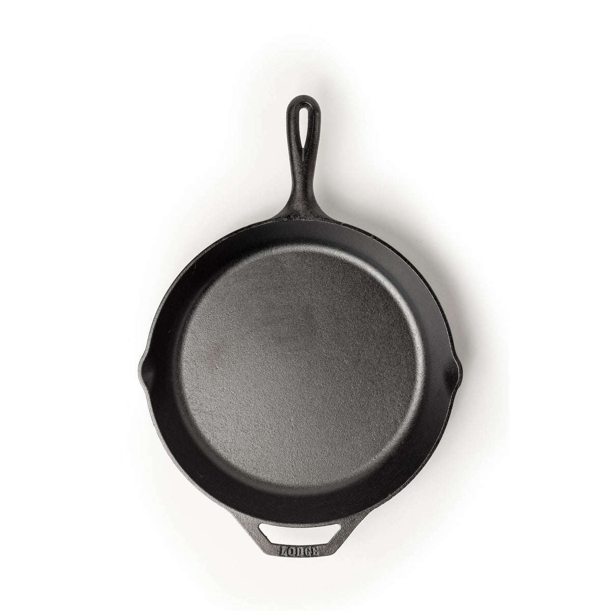 Lodge classic black cast iron skillet for cooking, with a smooth handle and sturdy construction, suitable for stove and oven use.