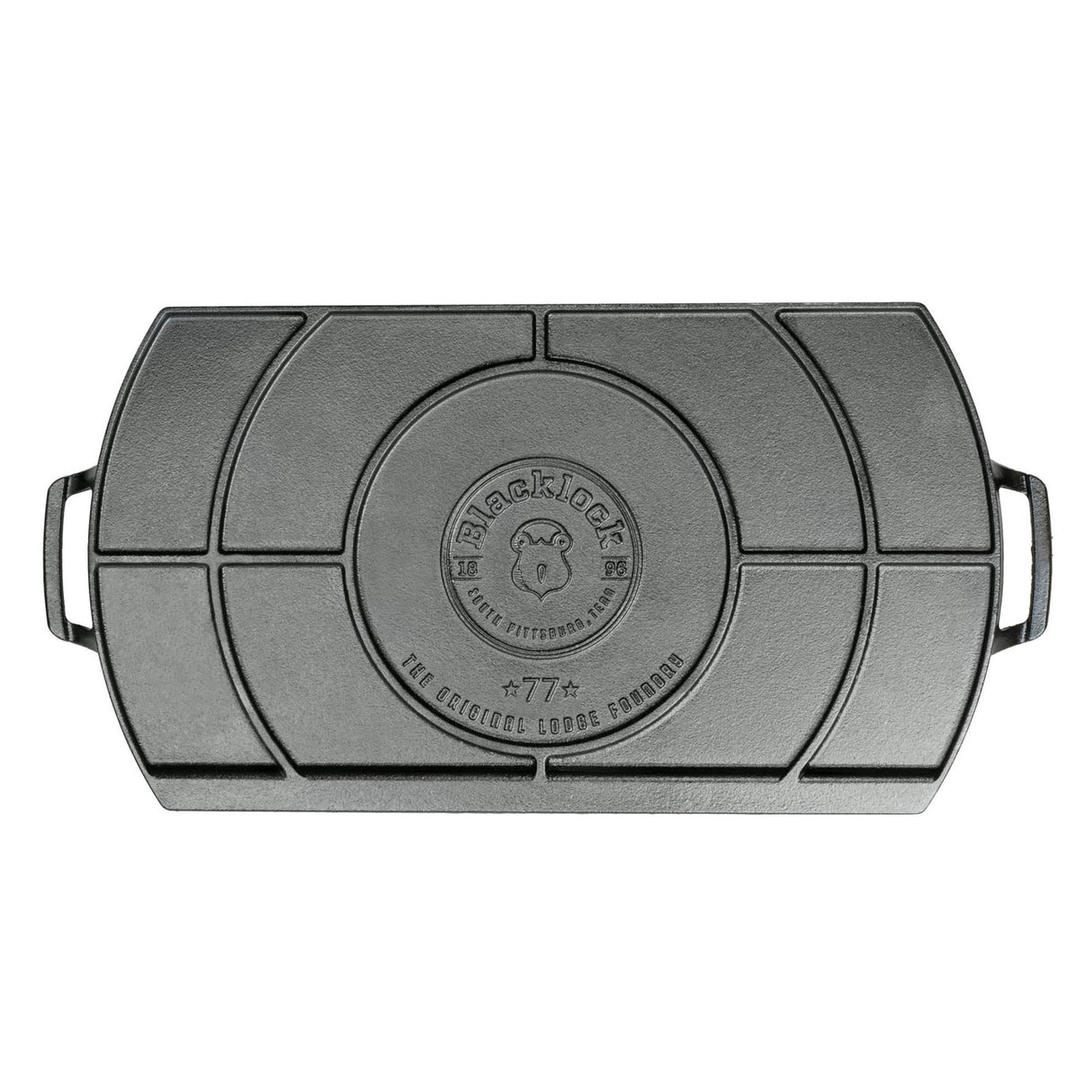 Schwarze Lodge Grillplatte BLACK LOCK, 51 cm, aus Gusseisen, zum Grillen und Braten geeignet, auf einer Küchenarbeitsfläche liegend