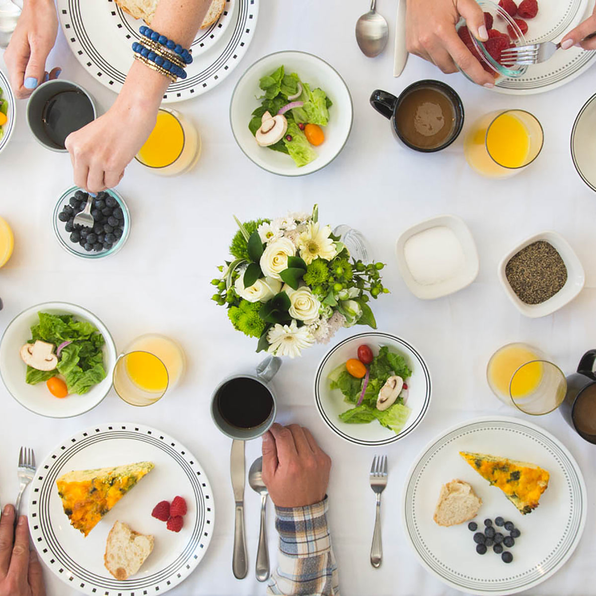 Corelle City Block white dinnerware set, includes plates and bowls, durable porcelain tableware for everyday use.