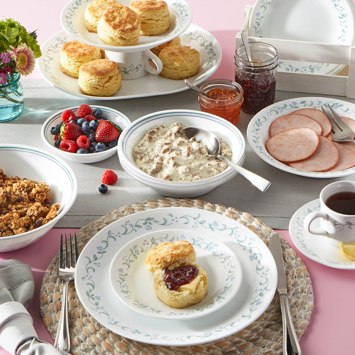 Corelle Country Cottage white dishware set with floral graphic design, showcasing plates and bowls for a charming kitchen look.