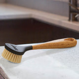 Braune Lodge Bürste aus Kunststoff mit ergonomischem Griff, ideal für Haarstyling und Pflege.
