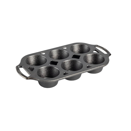 Schwarze LODGE Muffinform, klassische Backform aus Gusseisen für Muffins und Cupcakes, blickt auf hellem Küchenhintergrund.