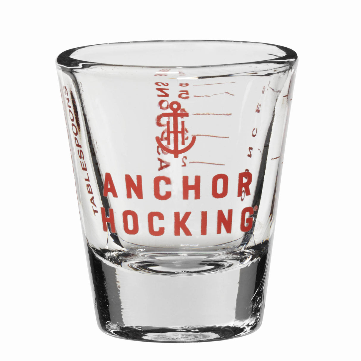 Rotes ANCHOR HOCKING Mess-Pinnchen mit 30 ml Inhalt, ideal zum Abmessen in der Küche, steht auf einer weißen Oberfläche