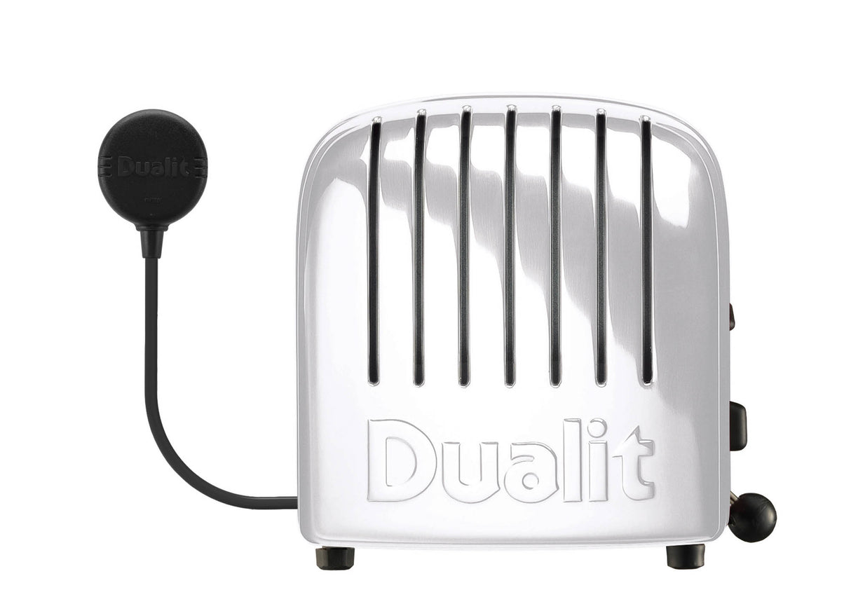 Weißer DUALIT NEWGEN Toaster mit zwei Toastscheiben, modernes Design, auf einer Küchenarbeitsplatte.