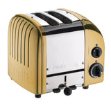 DUALIT Toaster Newgen aus Messing, 2 Scheiben, modernes Design, zeigt Toastschlitze und Bedienelemente in natürlicher Ansicht