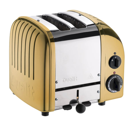 DUALIT Toaster Newgen aus Messing, 2 Scheiben, modernes Design, zeigt Toastschlitze und Bedienelemente in natürlicher Ansicht