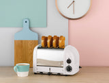 Weißer DUALIT Newgen Toaster mit Platz für 4 Brotscheiben, modernes Design und einfache Bedienung.