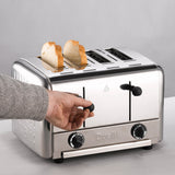 Schwarzer DUALIT Toaster für Gastro, Pop-up-Design, mit Toast-Funktion, auf einer Küchenarbeitsfläche stehend.