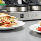 Polierter DUALIT Toaster Toastie mit Edelstahlgehäuse, Toastscheiben und Bedienelementen sichtbar
