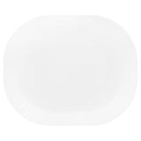 Corelle Winter Frost white dinnerware set featuring plates and bowls with a festive winter design on durable glass.