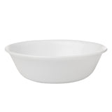 Corelle Winter Frost white dinnerware set featuring plates and bowls with a frosted snowflake design on ceramic porcelain.