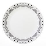 Corelle City Block white dinnerware set featuring plates, bowls, and cups arranged on a table for serving meals.