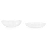Corelle Winter Frost white dinnerware set featuring plates and bowls with a frosted winter design on smooth ceramic.