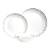 CORELLE Service in Mystic Gray mit weißen Geschirrteilen, zeigt Teller, Tassen und Schalen in elegantem Design