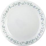 Corelle Country Cottage white dinnerware set with floral graphic, including plates and bowls, on a light background.