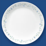 Corelle Country Cottage white dinnerware set with floral graphic design, includes plates and bowls, durable ceramic tableware.