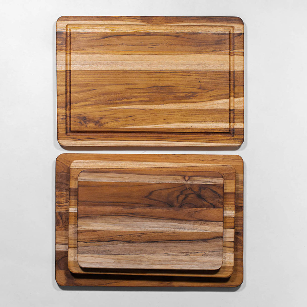 Teakholz-Schneidebrett ESSENTIAL von TEAKHAUS aus Teakholz, robust und langlebig für die Küche, mit natürlicher Holzmaserung.