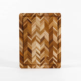 Teakholz-Schneidebrett von TEAKHAUS mit Herringbone-Muster, aus hochwertigem Teakholz gefertigt, ideal für die Küche.