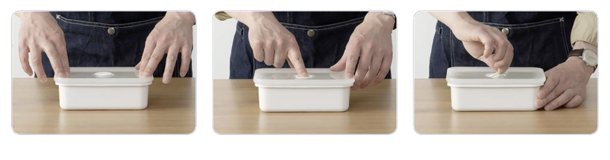 Weiße Emailledose von HONEYWARE mit Vakuumverschluss, 740 ml Fassungsvermögen, ideal für Lebensmittelaufbewahrung.