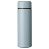 Weiße KYOCERA Isolierflasche SLIM MUG aus Edelstahl, mit schlankem Design und doppelwandiger Isolierung für heiße Getränke