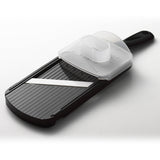 Schwarzer KYOCERA 4-stufiger Keramikhobel mit Griff und Schneidklingen, ideal für präzises Schneiden und Zubereiten.