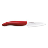Rotes KYOCERA Keramikmesser GEN RED mit scharfer Klinge, ideal zum Schneiden von Obst und Gemüse, auf hellem Hintergrund.