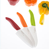 Grünes KYOCERA Keramikmesser mit ergonomischem Griff, ideal zum Schneiden von Obst und Gemüse, langlebig und scharf.