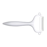 Grüner KYOCERA Schäler mit doppelseitigem Schliff, ideal zum Schälen von Obst und Gemüse, sichtbarer Klingen- und Griffbereich