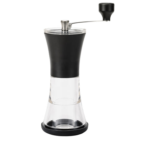 Schwarze KYOCERA Keramik-Kaffeemühle mit Deckel, Nahaufnahme der Mühle und ihrer Keramikmahlwerke.