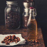 KILNER Einkochflasche CLIP SQUARE, klare Glasflasche mit Metallverschluss, ideal für Einmachgläser und Konservierung.