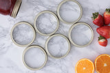 KILNER Ersatzteile für Einkochgläser, verschiedene Zubehörteile für Glaswaren, in Nahaufnahme.