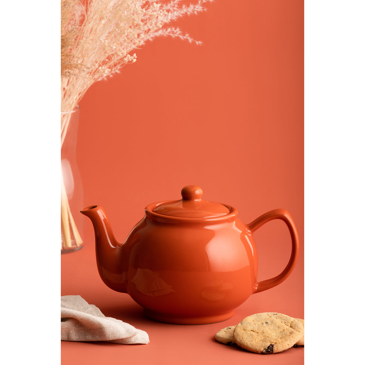 Teekanne von PRICE & KENSINGTON mit orangenem Design, aus Keramik, mit Deckel und Henkel, für Tee-Genuss.