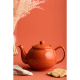 Teekanne von PRICE & KENSINGTON mit orangenem Design, aus Keramik, mit Deckel und Henkel, für Tee-Genuss.