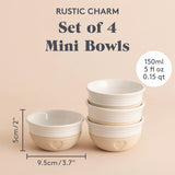 Vier beige Schüsseln im Mason Cash Rustic Charm 4er-Set, robustes Geschirr für die Küche, detailreiche Oberflächenstruktur.