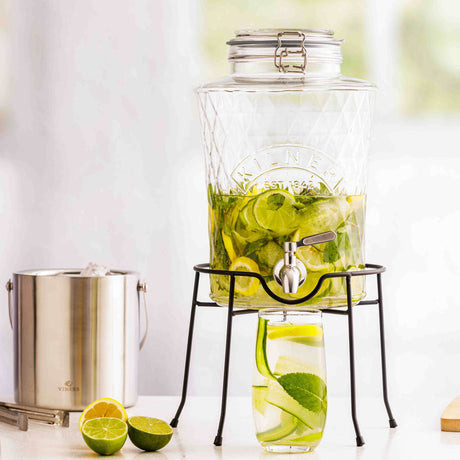 KILNER Diamond drink dispenser with clear glass body and metal spigot for serving beverages at gatherings.