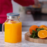 KILNER Glaskrug aus klarem Glas, 1,2 Liter Fassungsvermögen, mit Henkel und glatter Oberfläche.