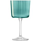 Set of four emerald green LSA GEMS wine glasses with elegant design, perfect for serving and enjoying wine.