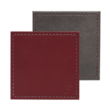 Vier Untersetzer-Set von Freeform in Burgund und Anthrazit, langlebiges Material, ideal zum Schutz von Tischen.