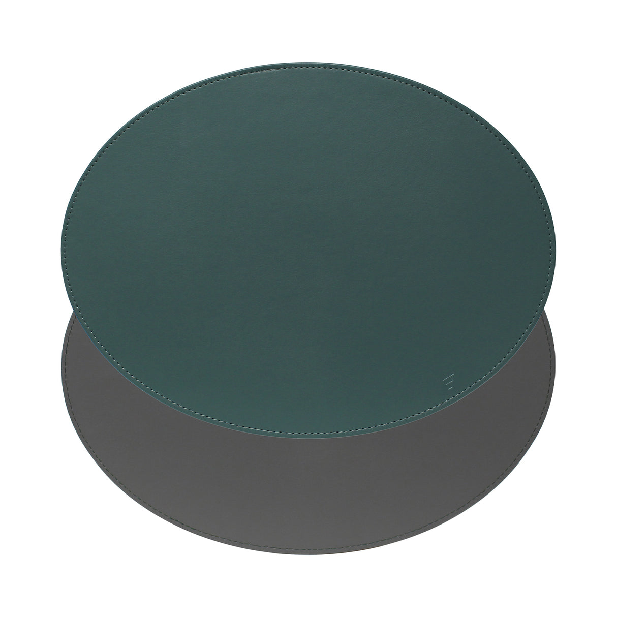 Ovales Platzset DUO von FREEFORM in Petrol und Anthrazit, zeigt die elegante, gepolsterte Oberfläche und das stilvolle Design.