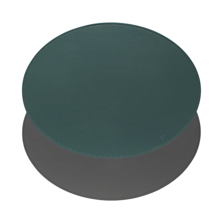 Ovales Platzset DUO von FREEFORM in Petrol und Anthrazit, zeigt die elegante, gepolsterte Oberfläche und das stilvolle Design.