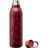 Rote ALADDIN Isolierflasche CITY LOOP, 600 ml, mit doppelwandiger Isolierung und Trinkverschluss, auf einem Tisch.