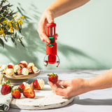 Roter Obst-Entkerner HULLAPIT von DREAMFARM, 12,5 cm, mit Edelstahlklinge zum Entfernen von Kernen aus Früchten.