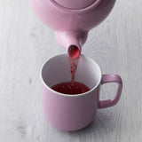 Pastell-pinke Teekanne von PRICE & KENSINGTON aus Keramik mit elegantem Design, perfekt für Tee-Zubereitung.