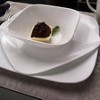Weiße Müslischale von Corelle, langlebiges Porzellan, elegantes Design für Frühstück und Snacks, klare Linien und glatte Oberfläche.